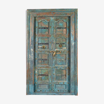 Wooden door with blue patina