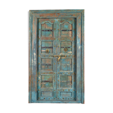 Wooden door with blue patina