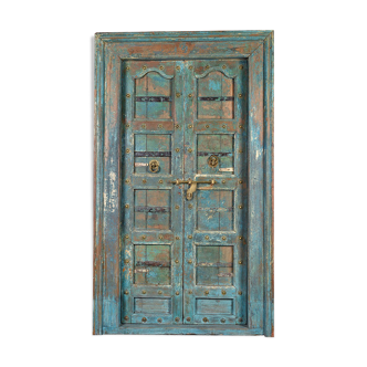 Wooden door with blue patina