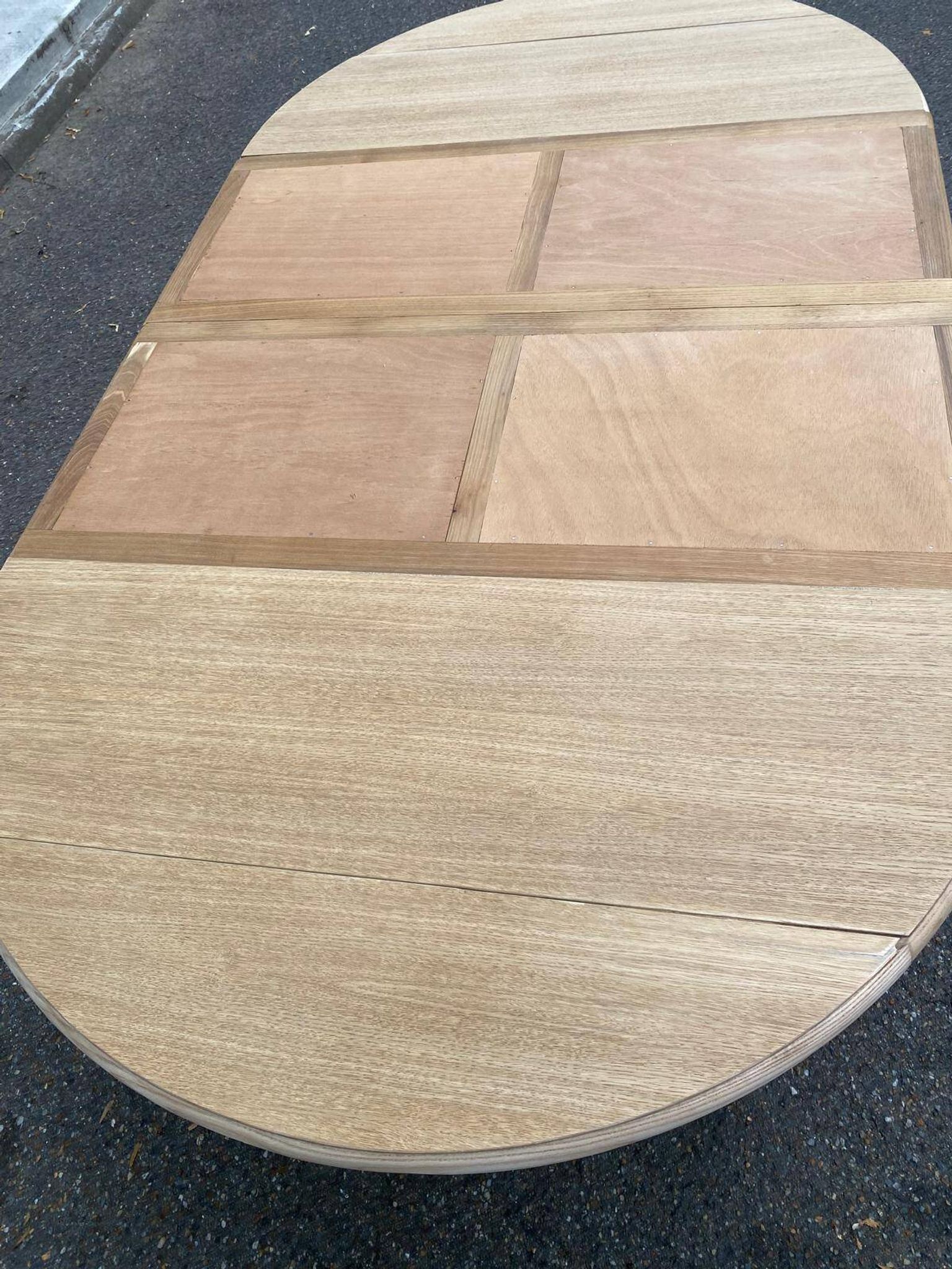 Table à manger ronde volets extensible Louis Philippe décapée en chêne brut