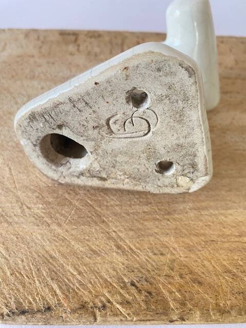 Enamelled earthen coat hook, 1900