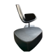 Fjord armchair by Moroso with its pouf, designed by Patricia Urquiola in 2002, made of steel and smooth black leather.