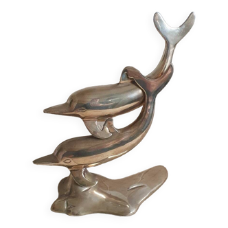 Brass dolphins