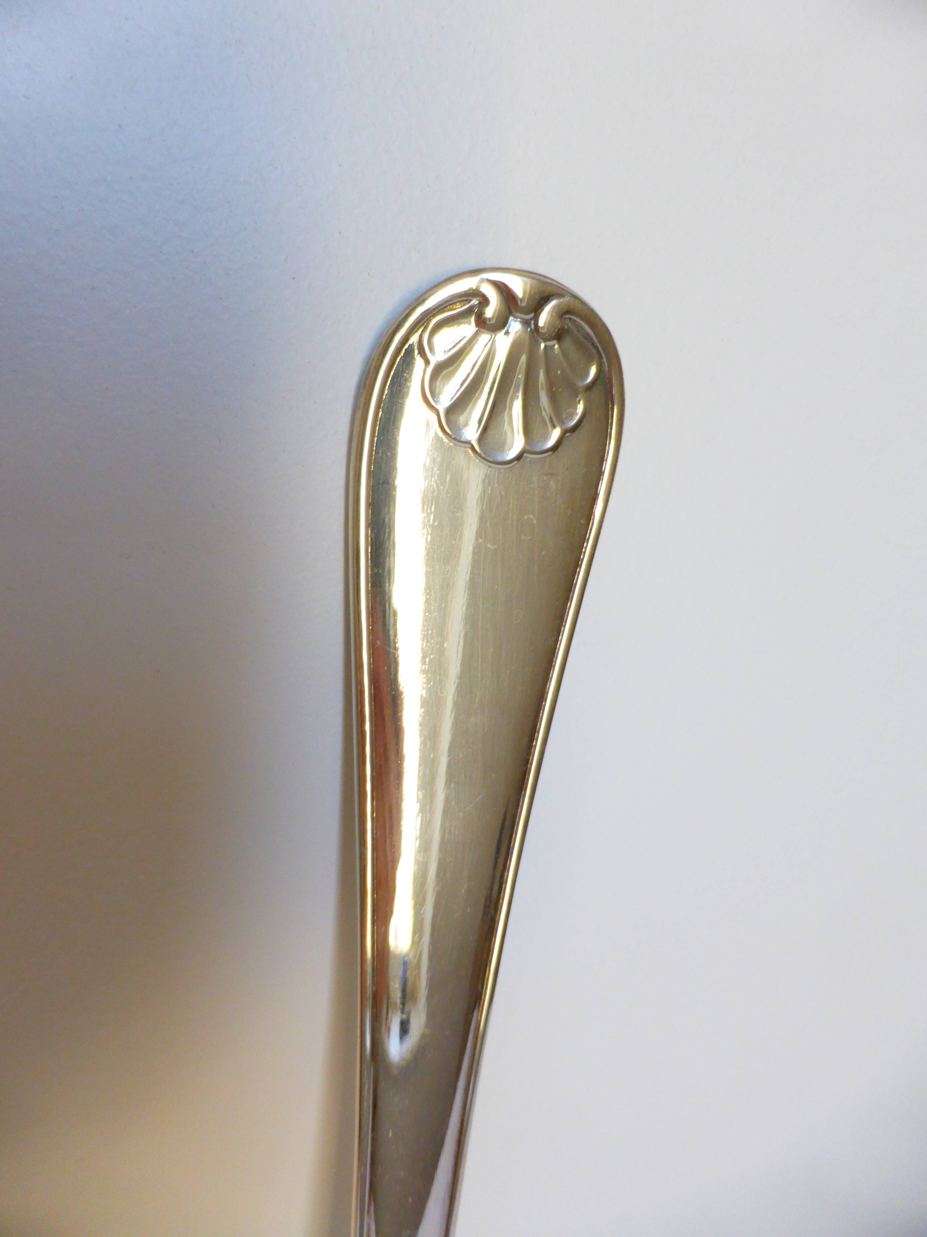 1 silver-plated metal ladle stamped 2106248
