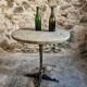 Bistro table / old garden with a cast iron base and stone top, France