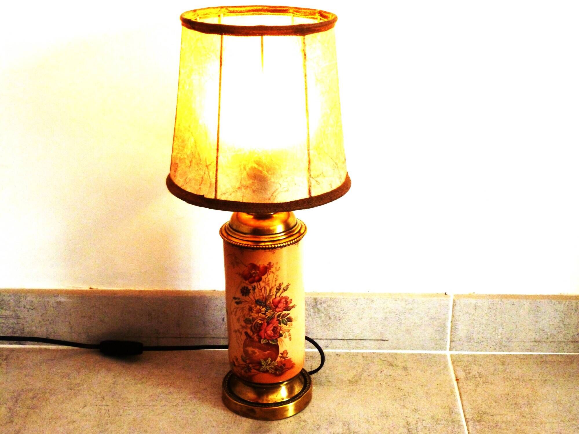 Old ceramic lamp "Lunéville" with a pig bladder shade.