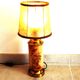 Old ceramic lamp "Lunéville" with a pig bladder shade.