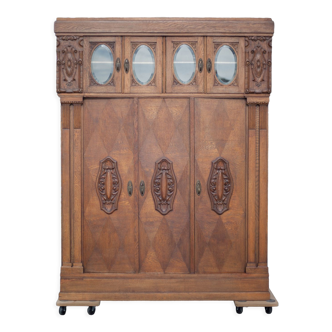 Armoire bibliothèque bois sculpté 3 portes ancienne, vitre hublot biseauté