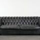 Set consisting of a cowhide leather Chesterfield sofa and matching ottoman