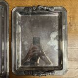 2 silver metal serving trays