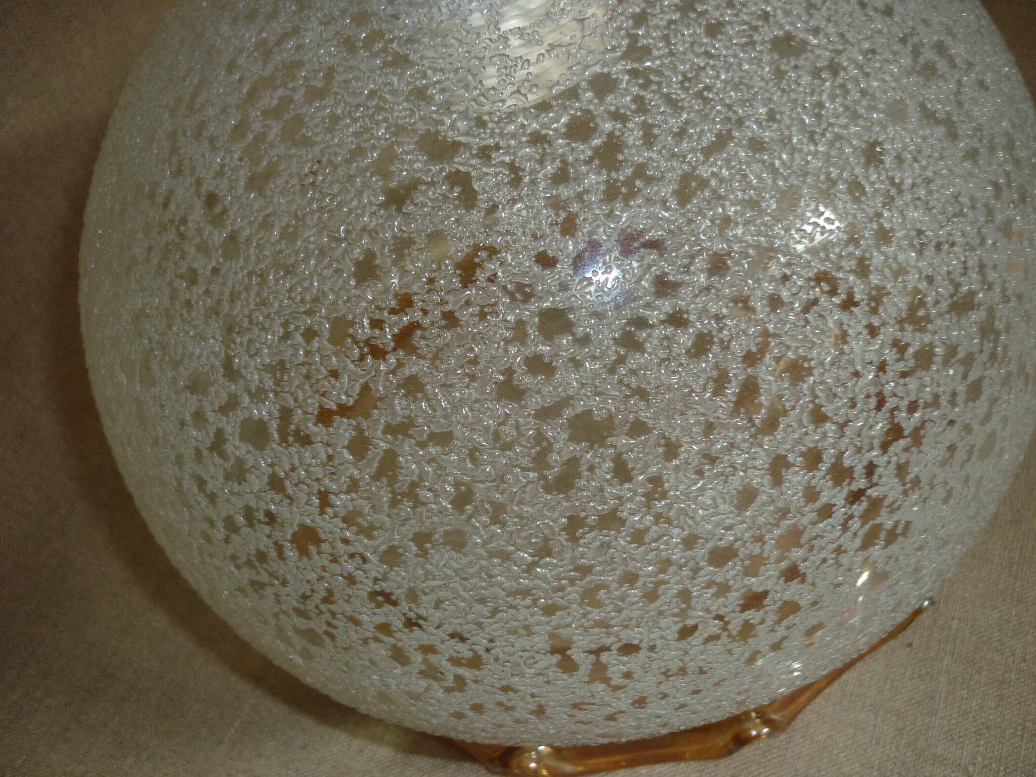 Chandelier in scratched glass and moiré rim