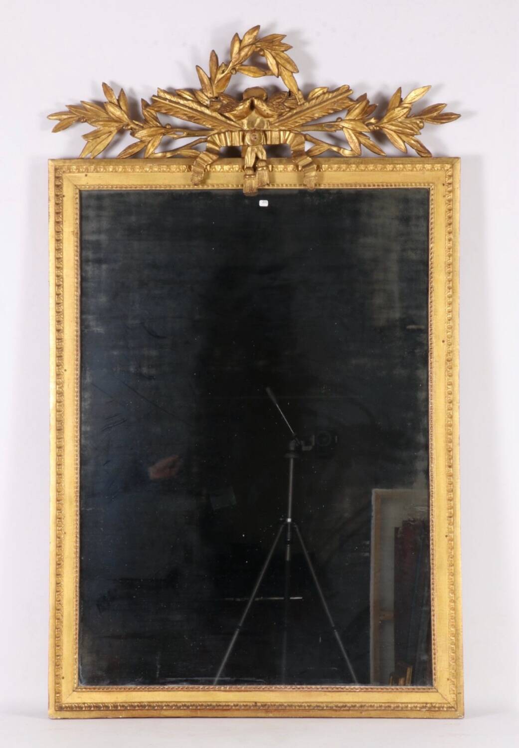 Louis XVI mirror in gilded wood, 18th century.