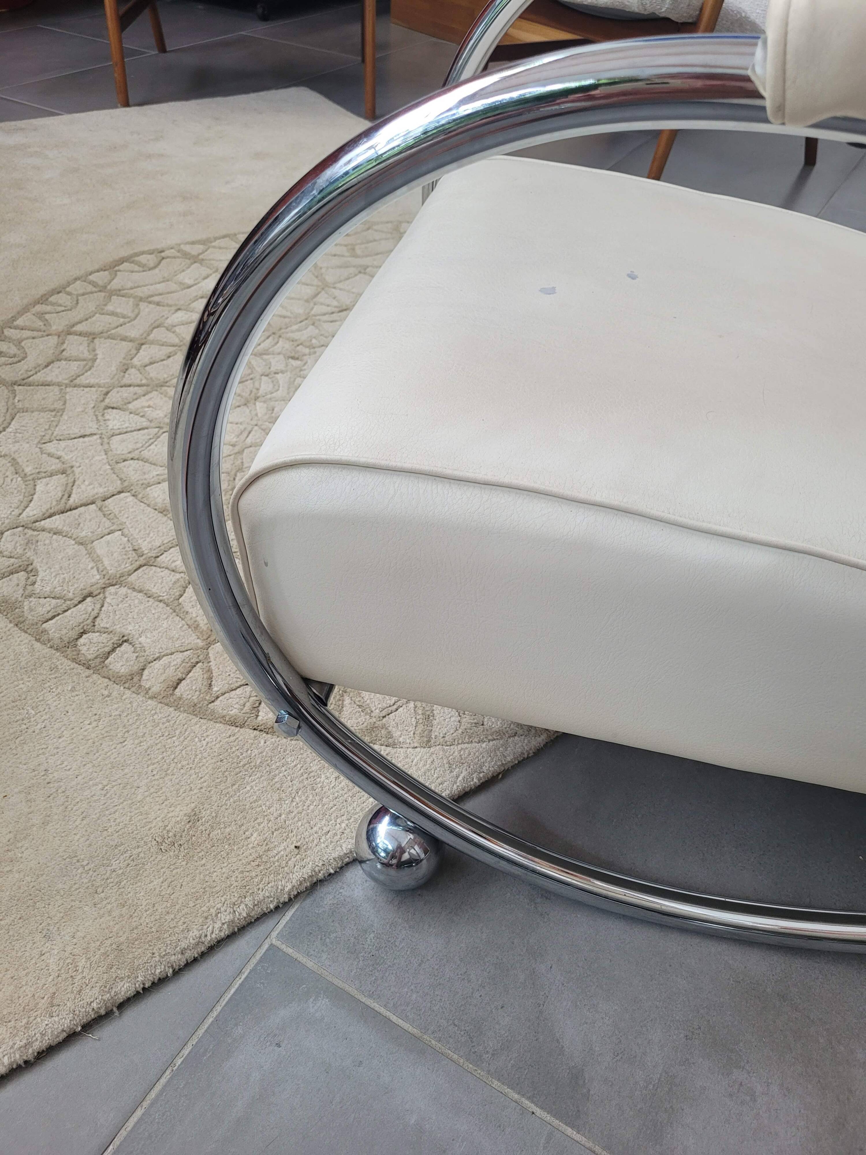 Sofa and armchair with chrome tubular structure modernist style