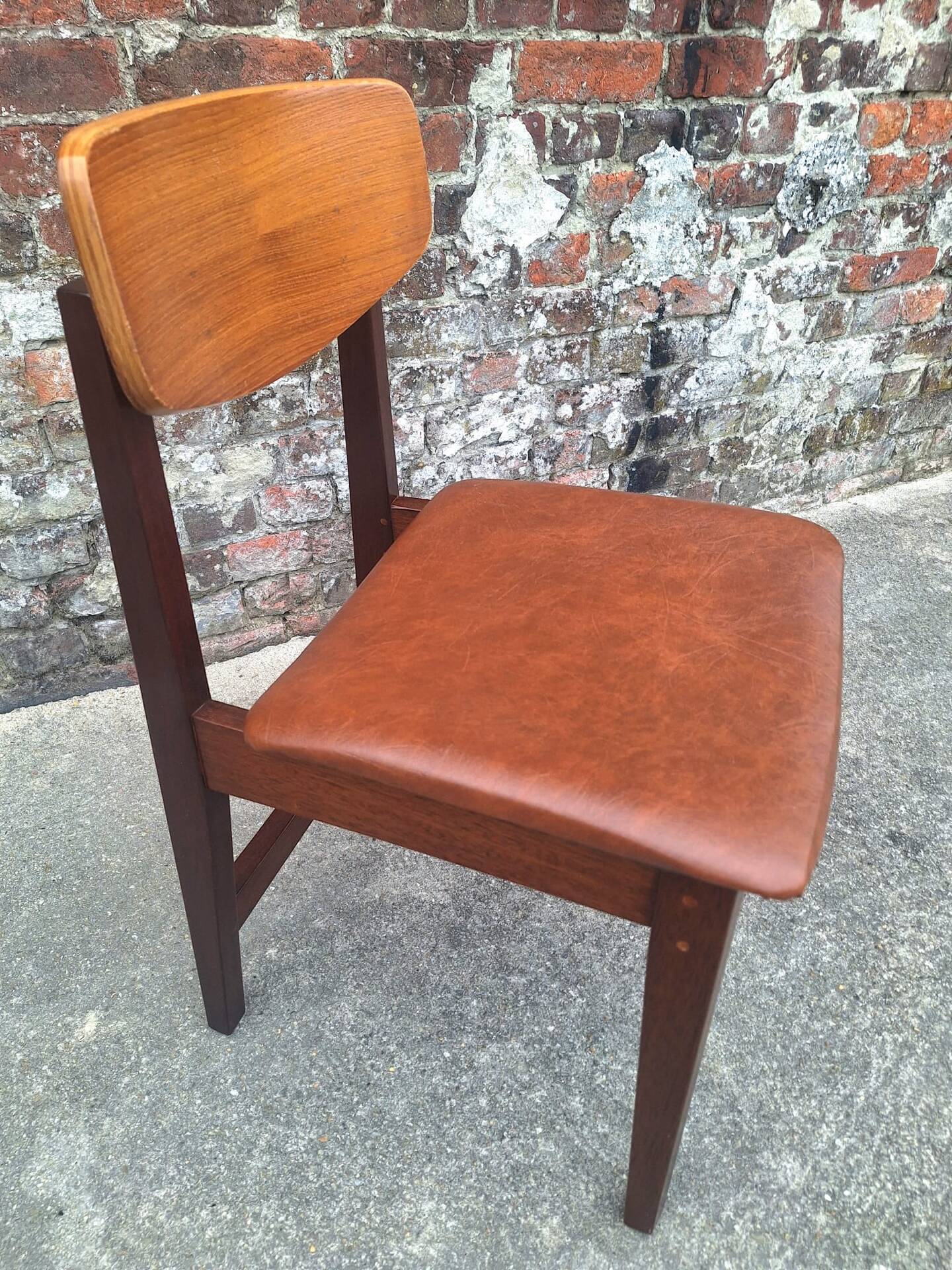 Vintage Scandinavian chair in teak, antique seating furniture.
