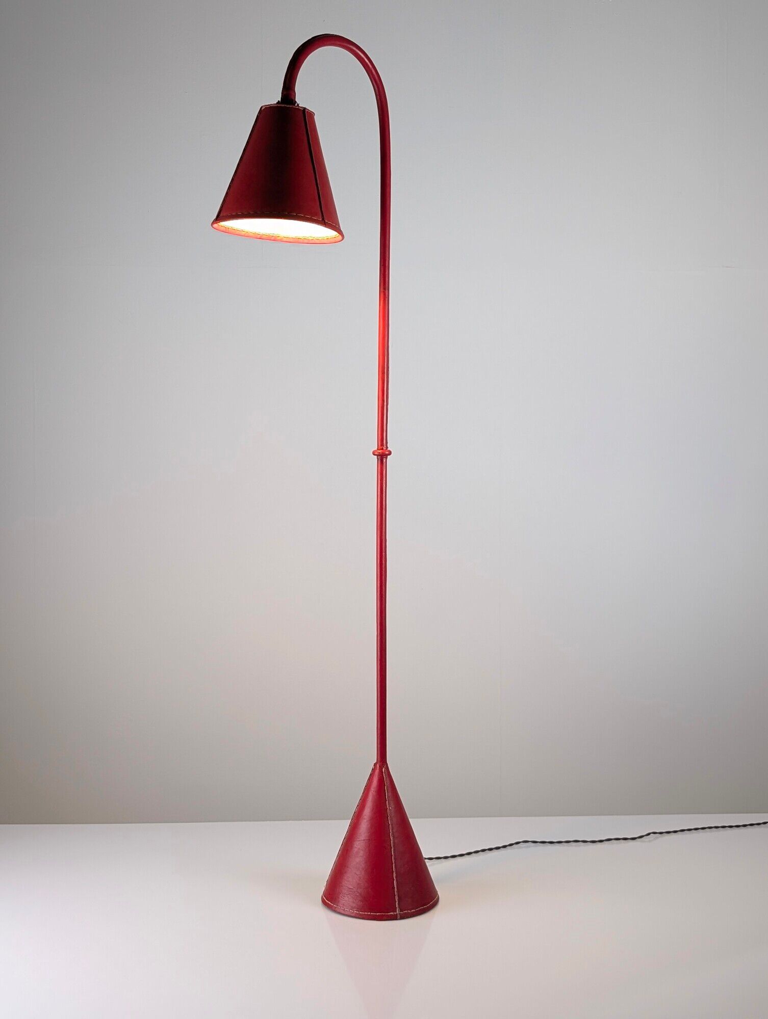 Jacques Adnet floor lamp in red leather, mid-century modern, France, 1960s
