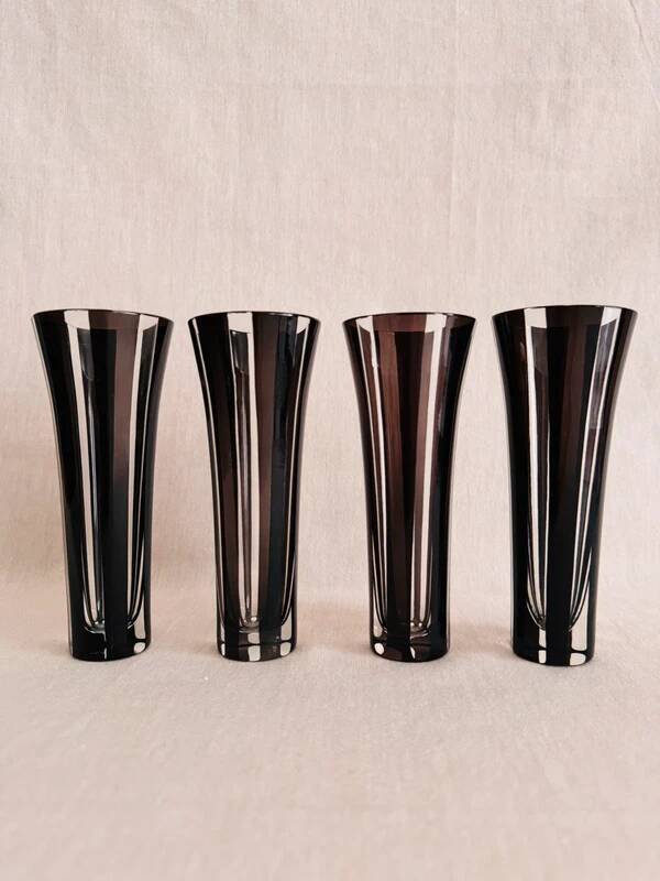 4 vintage champagne flutes in clear and black crystal glass