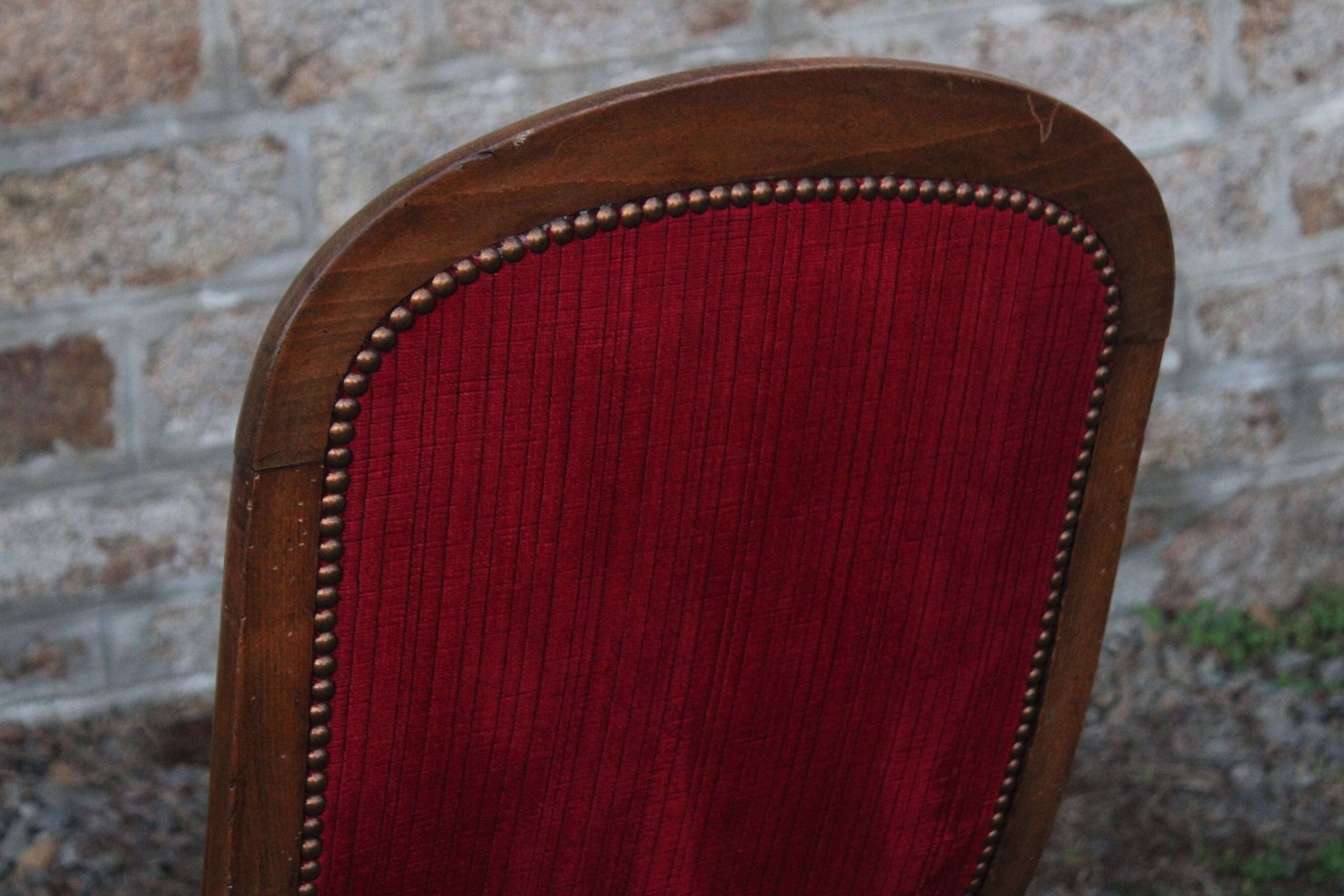 Antique Voltaire-style armchair – red velvet & solid wood