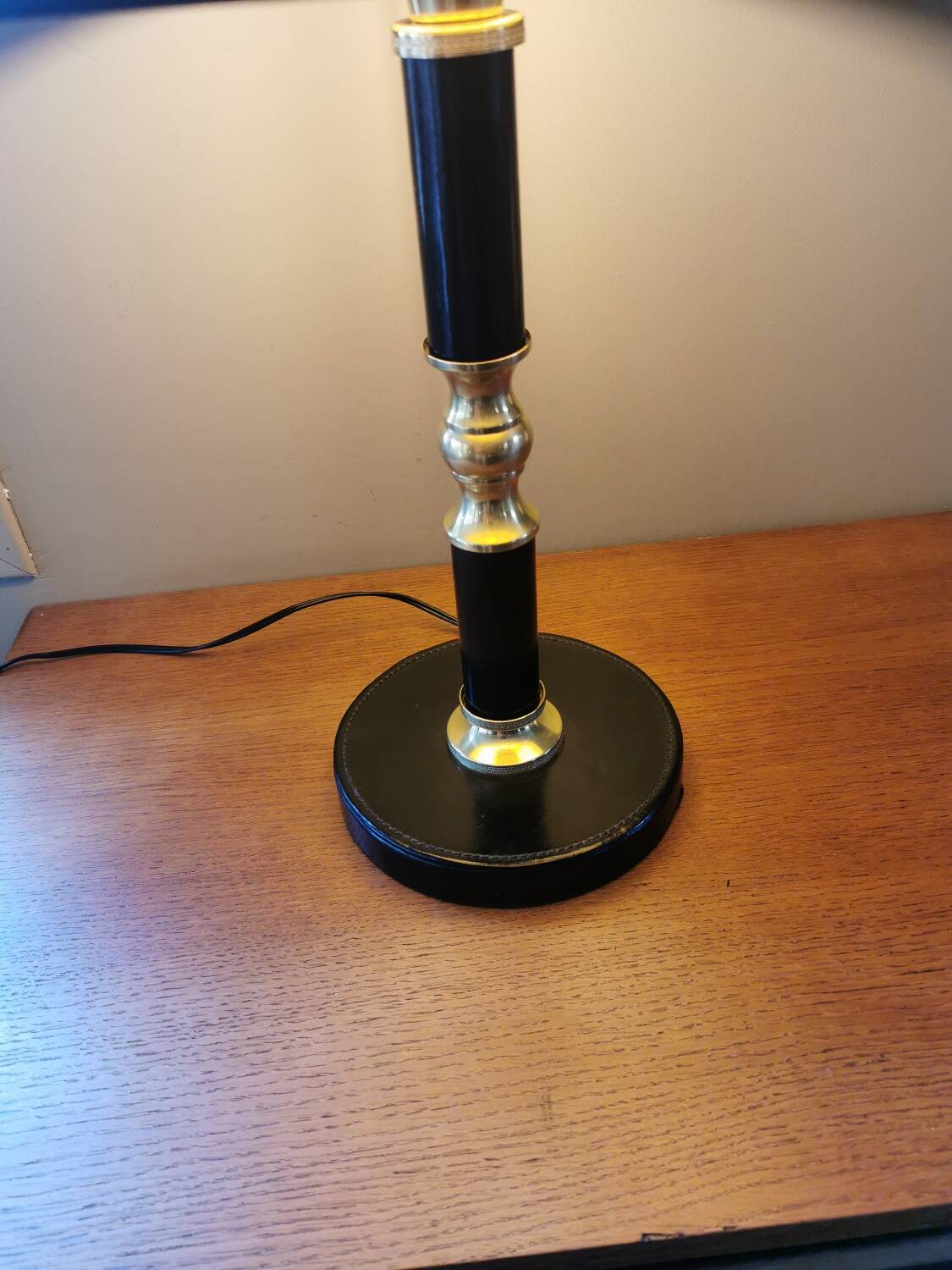Vintage lamp base in black leather and brass