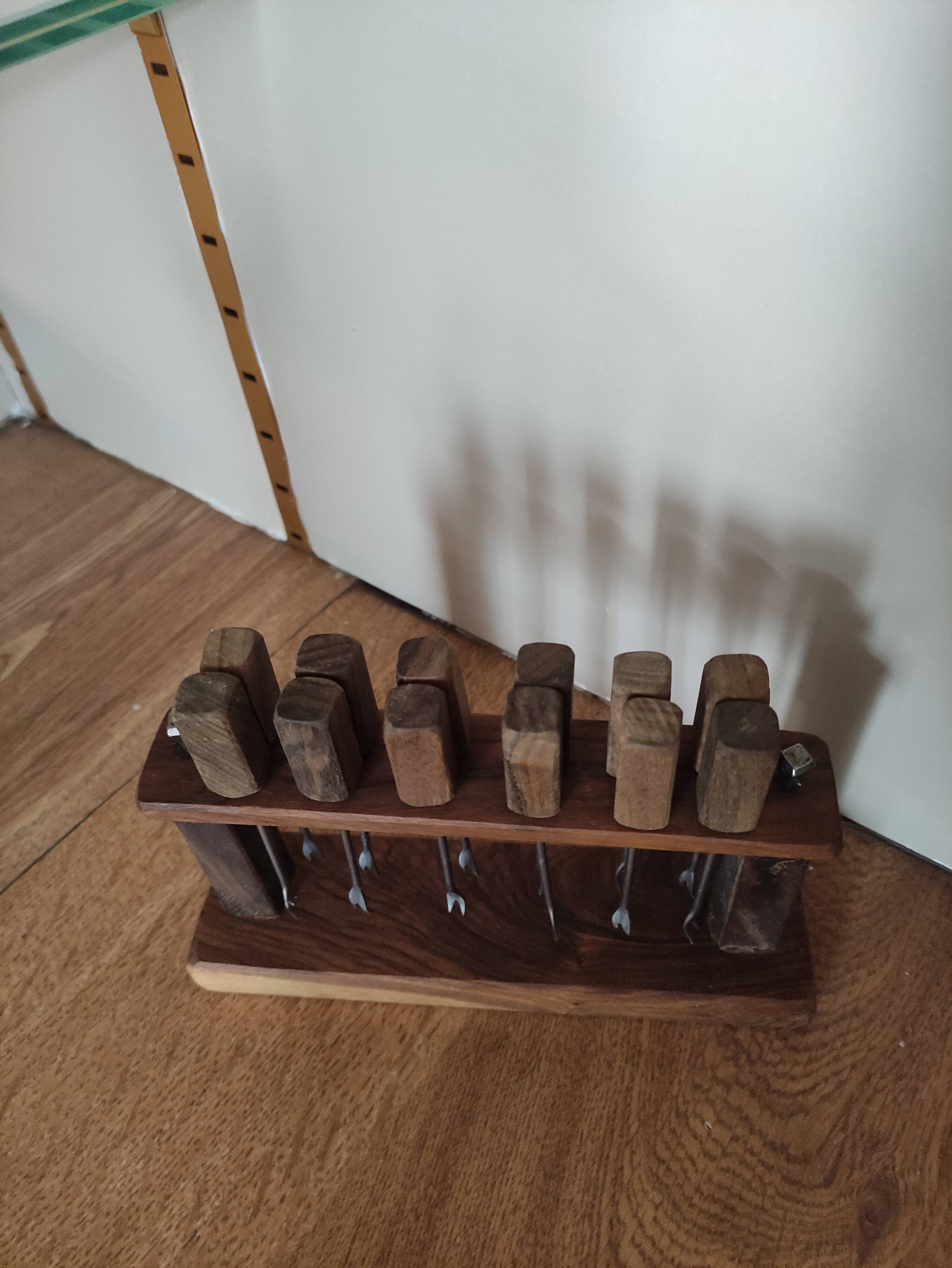 12 snail forks with wooden display