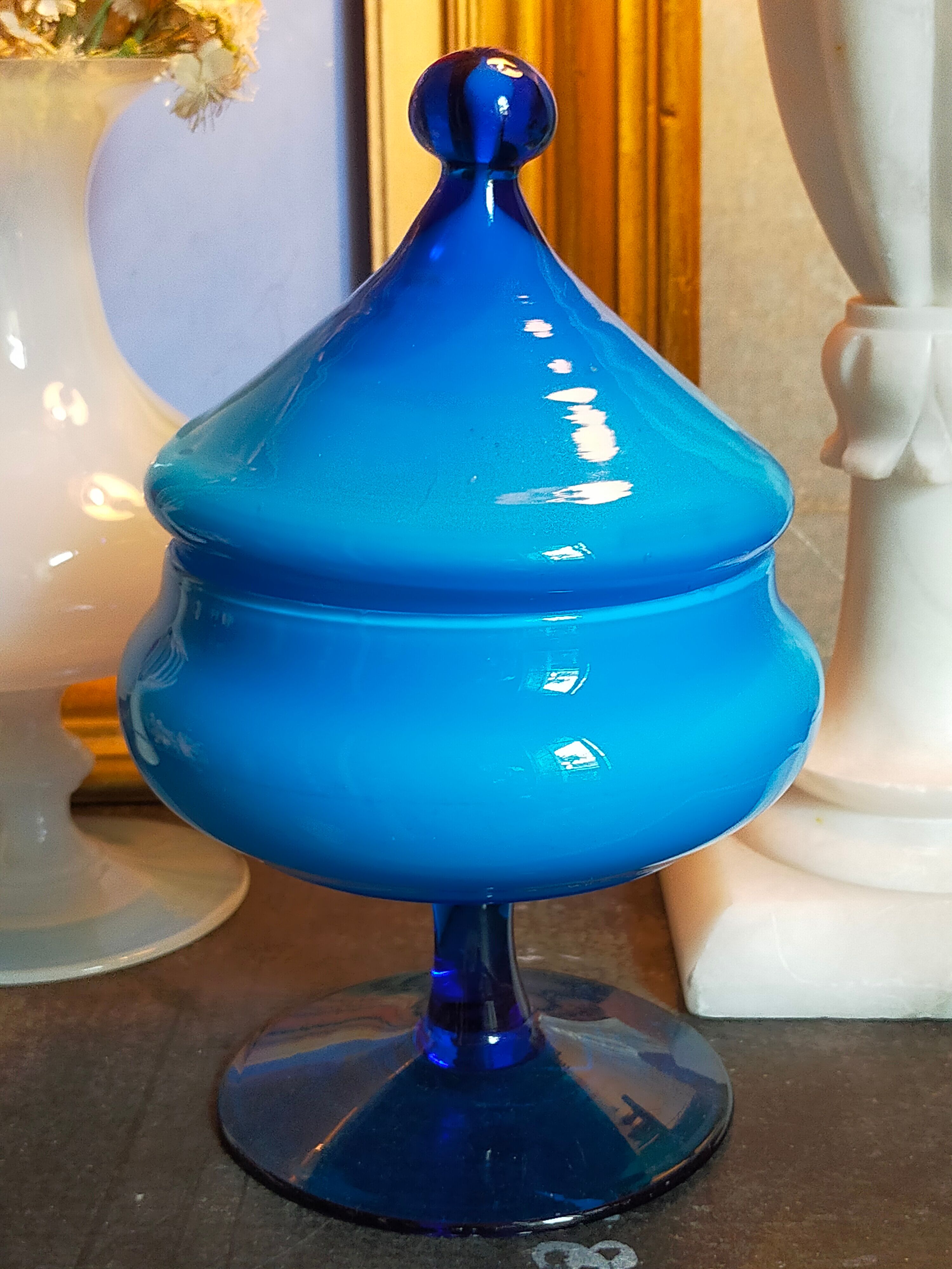 Covered pot on foot in vintage blue opaline