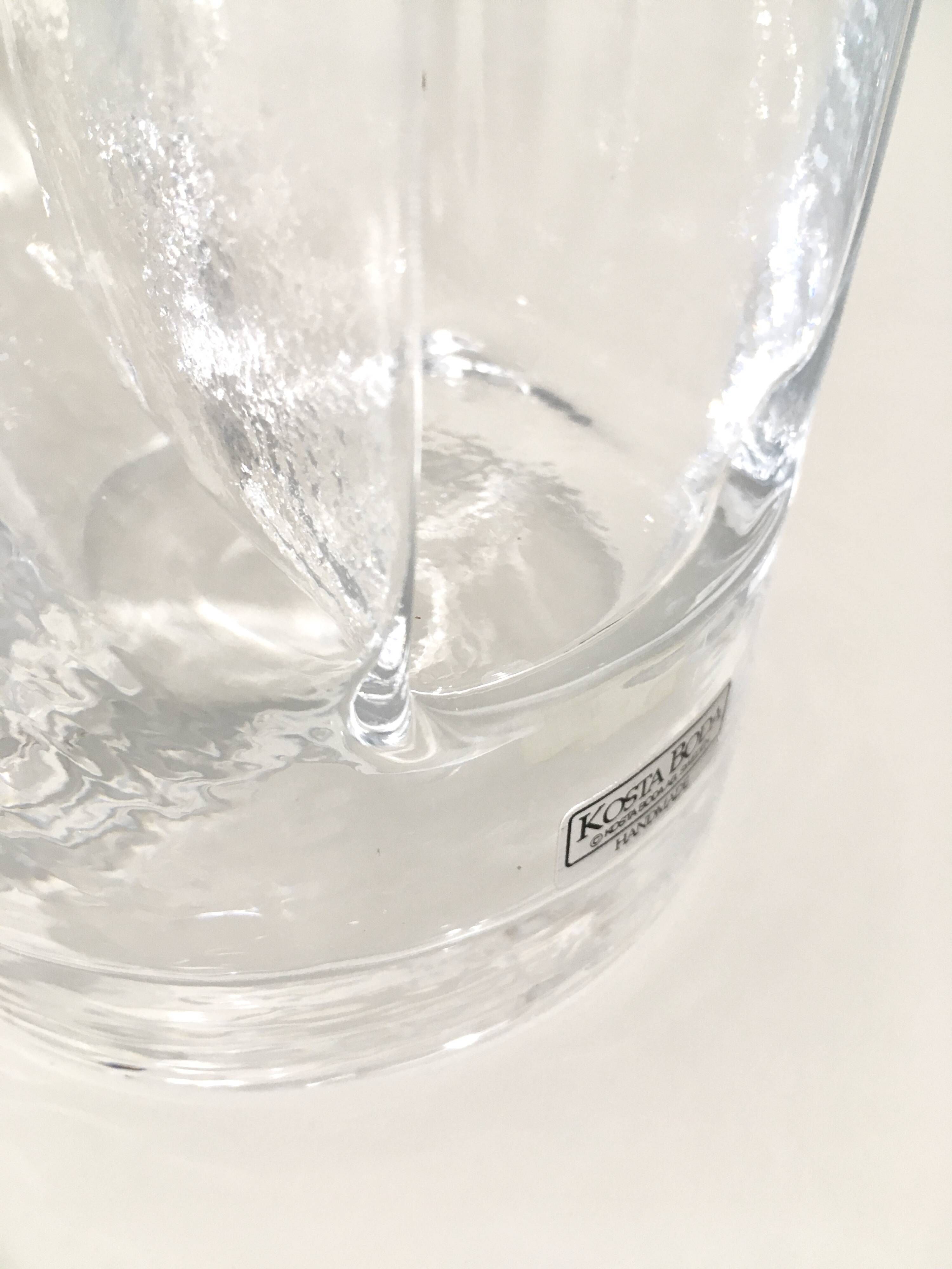 Kosta Boda carafe in blown glass 26 cm with sculptural imprint • Sweden