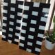 "Pair of GYLLEN wall lights – IKEA – black and white check pattern – graphic design"