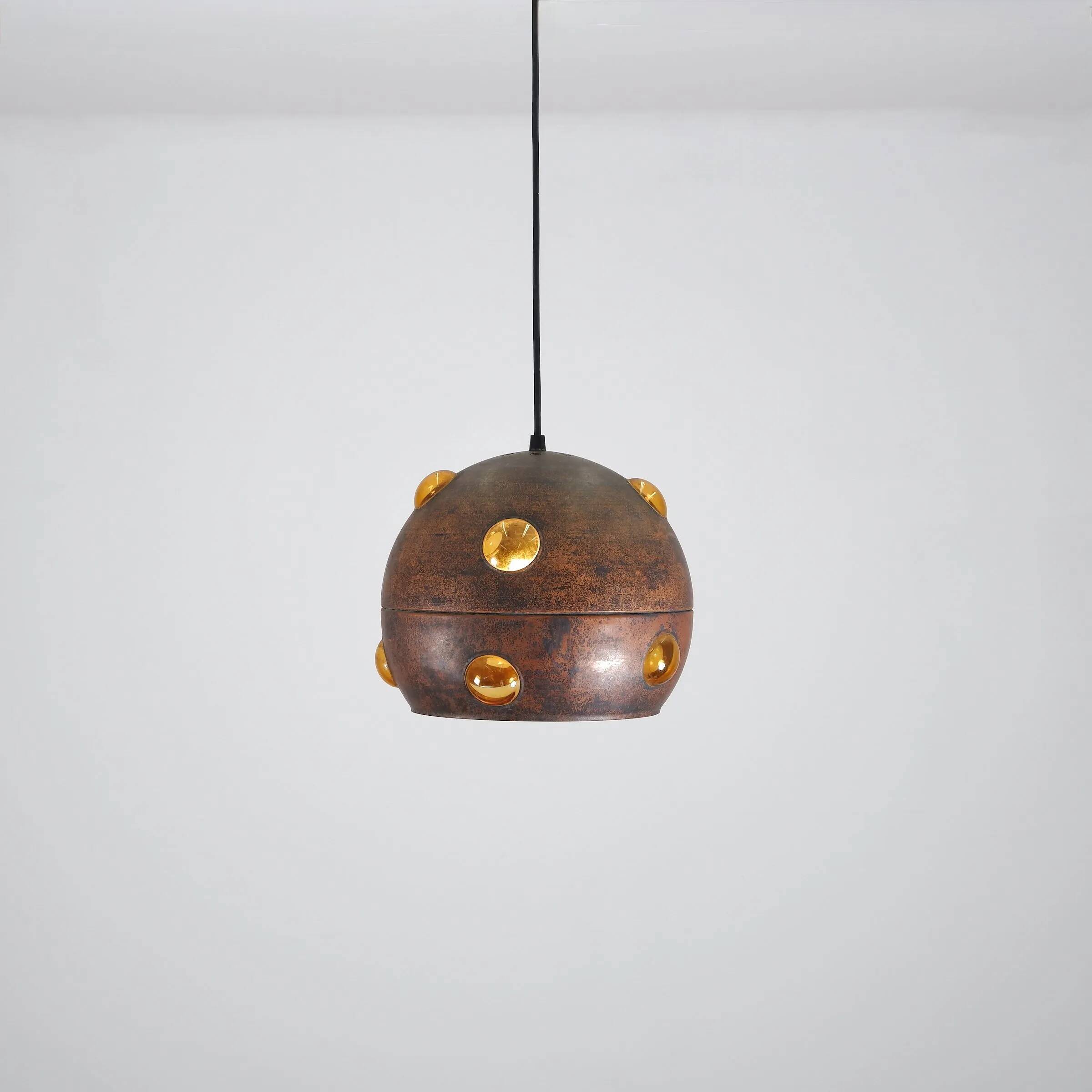 Large, globular brutalist hanging lamp in copper / glass by Peill & Putzler