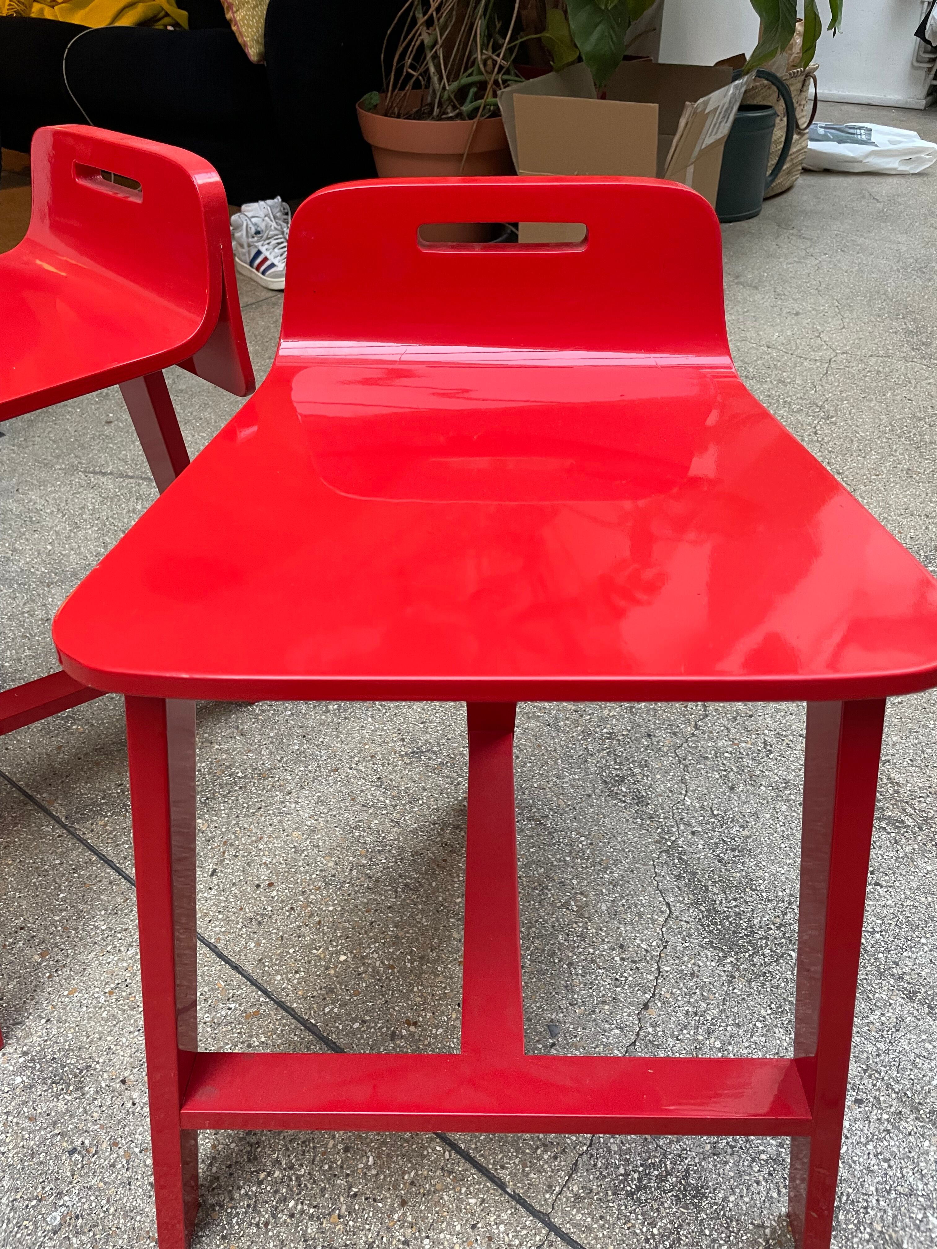Set of two red design stools