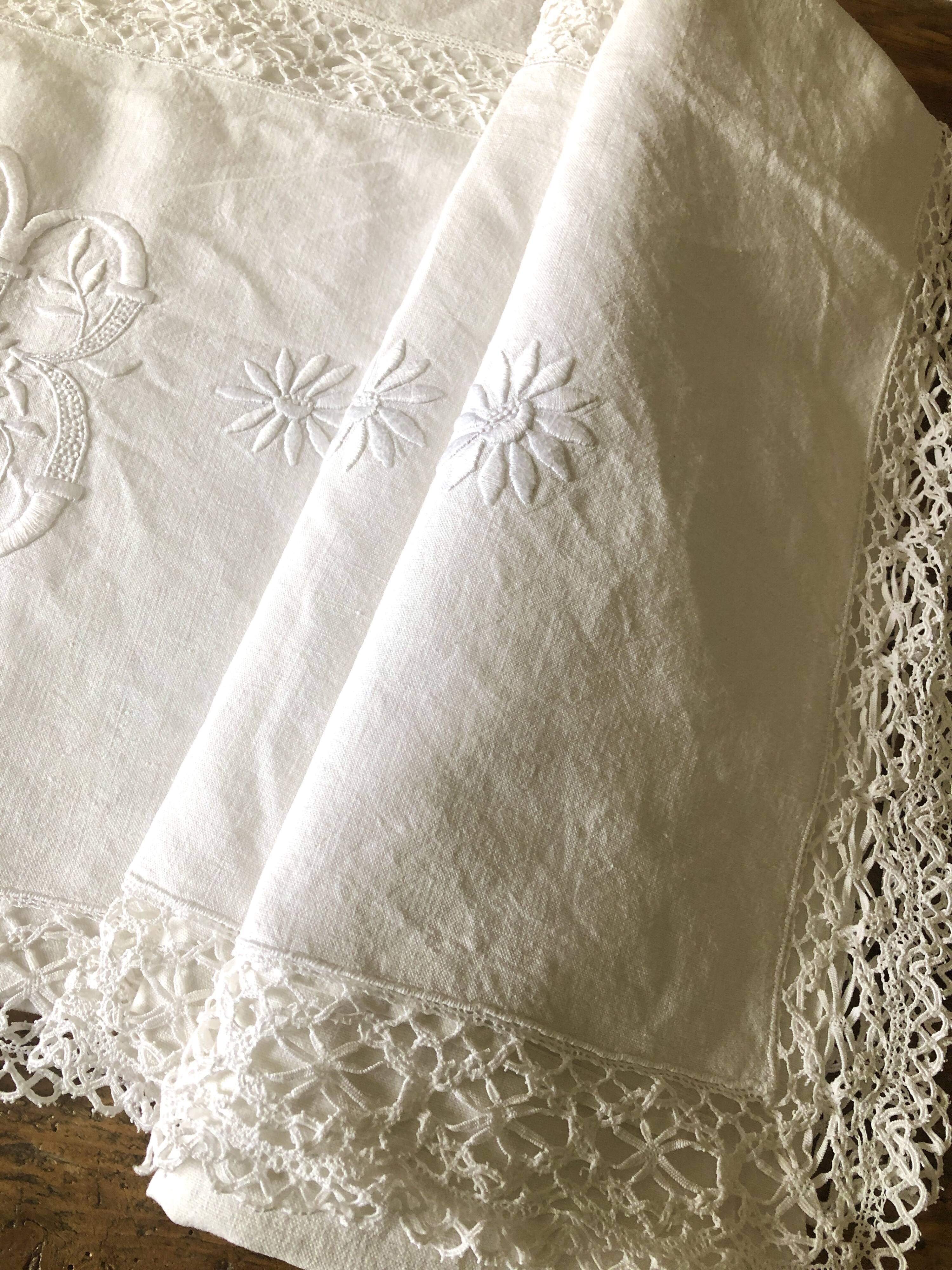 Old embroidered cloth, monograms and lace