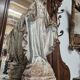 Garden statue of the Virgin Mary in old reconstituted stone