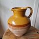 Antique glazed terracotta pitcher, brown semi-glazed jug, vase