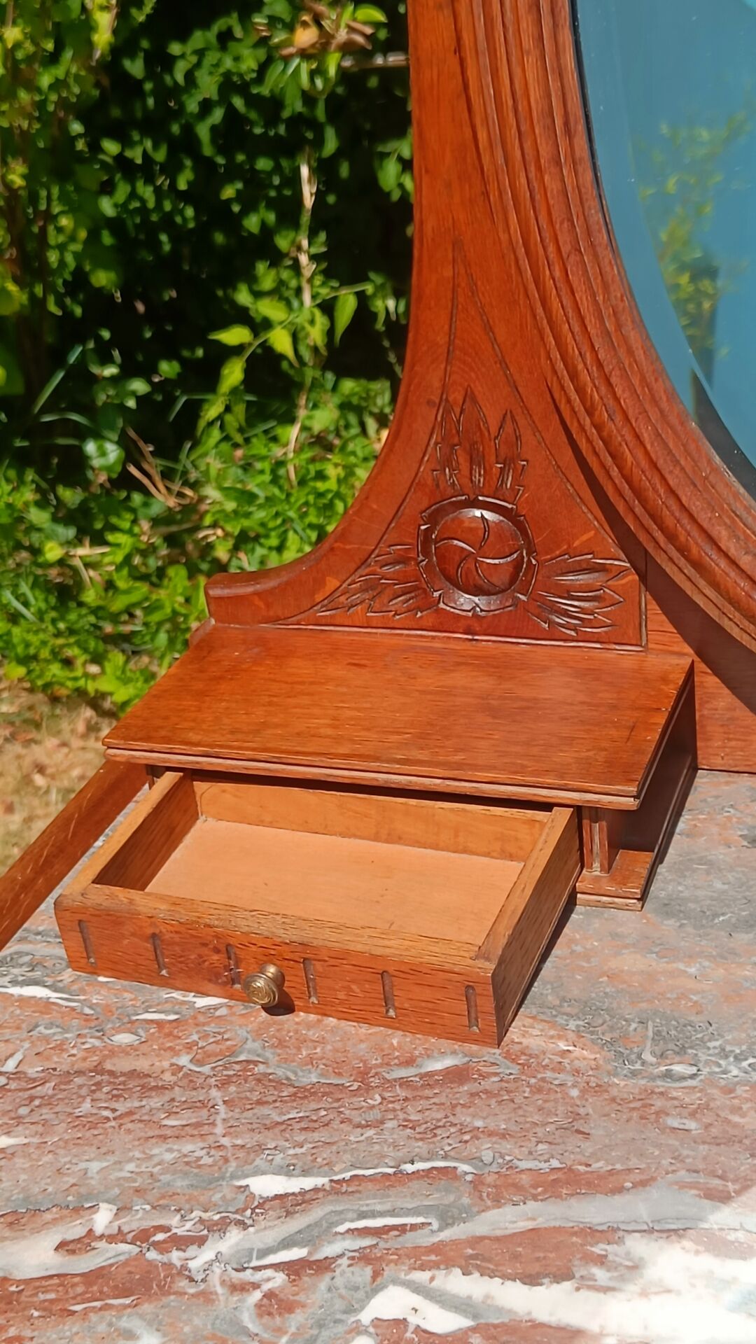 Art Deco oak dressing table, marble top and swivel mirror.