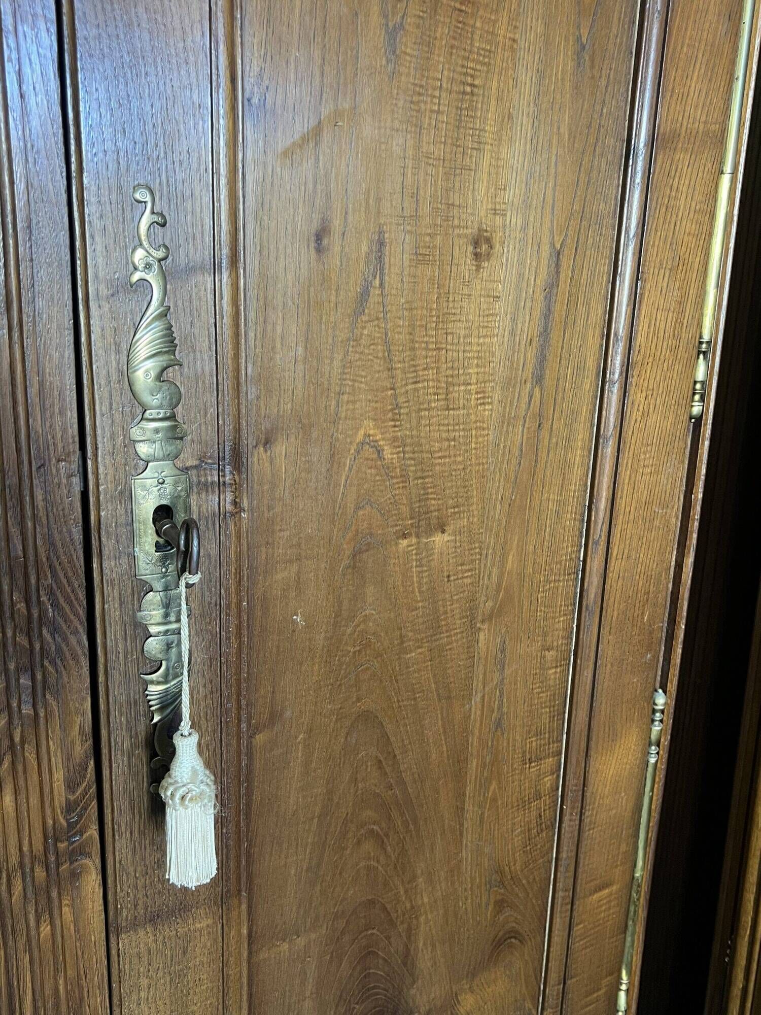 Very beautiful and old carved wooden wardrobe from the 19th century, small size, height 211 cm.