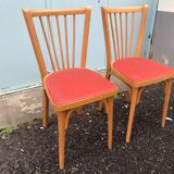 2 red Baumann bistro chairs