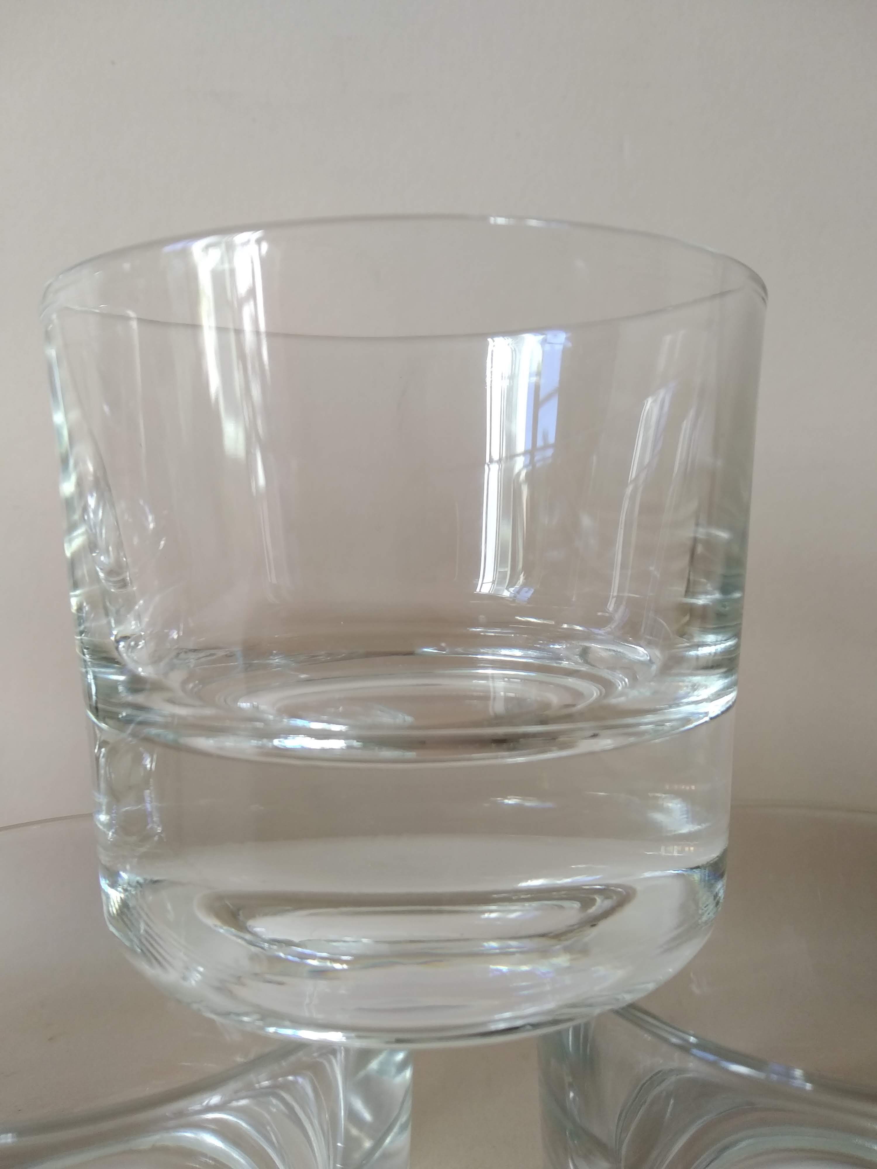 Glasses cups with thick bottom with water or vintage spirits 70