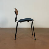 Wooden chairs and skaï