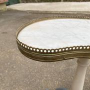 Pair of marble and ivory tripod pedestal tables