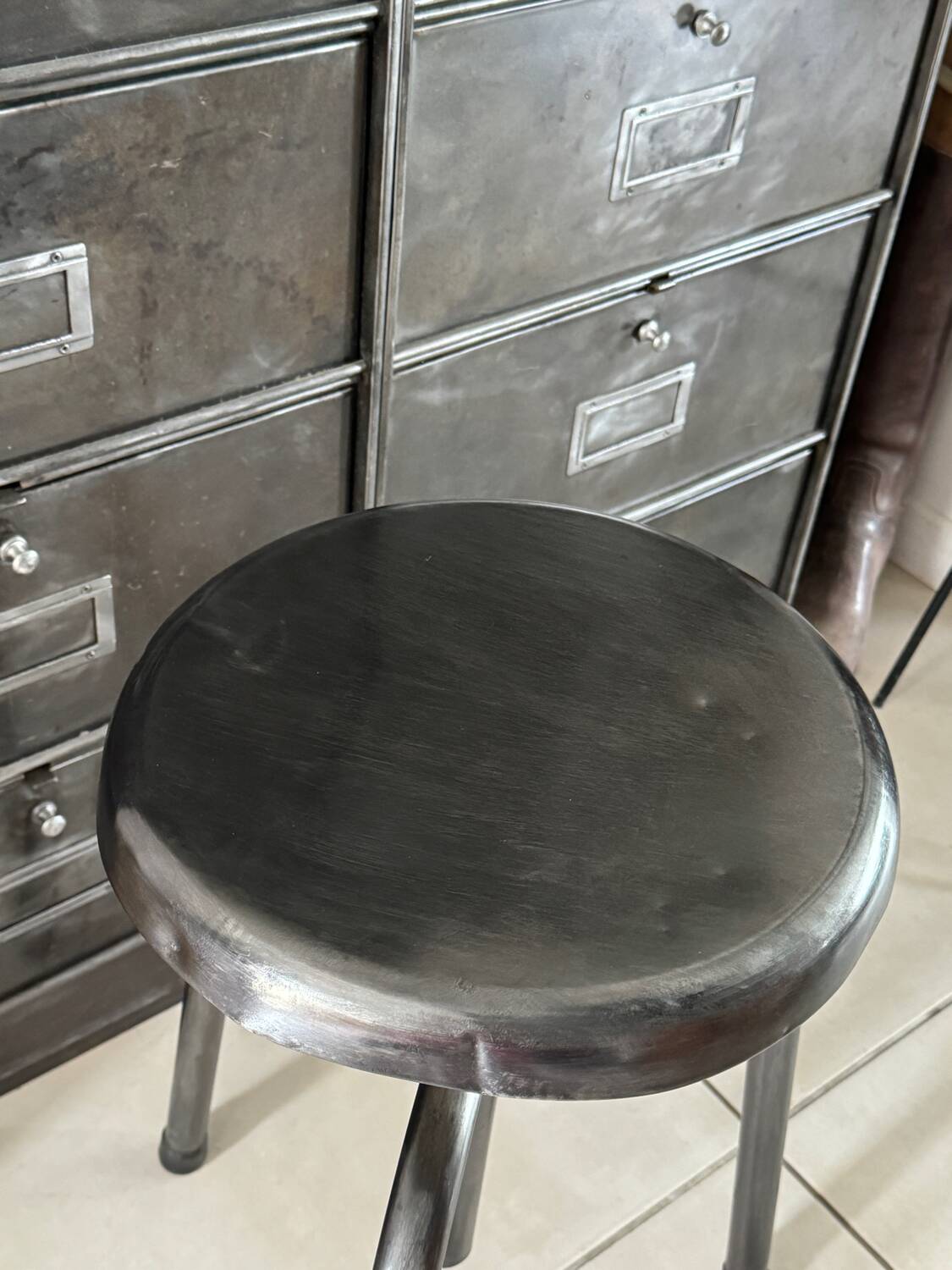 Height-adjustable tripod metal stool