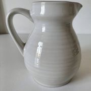 Ceramic pitcher from Quimper, created by Dominique Villard.