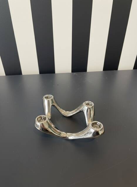 Quatra Chrome candlestick chandelier inspired by "Cobra"