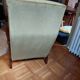 Lot of 2 olive green velvet armchairs.