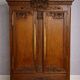 Norman Wedding Armoire in solid oak, richly carved, Louis period.