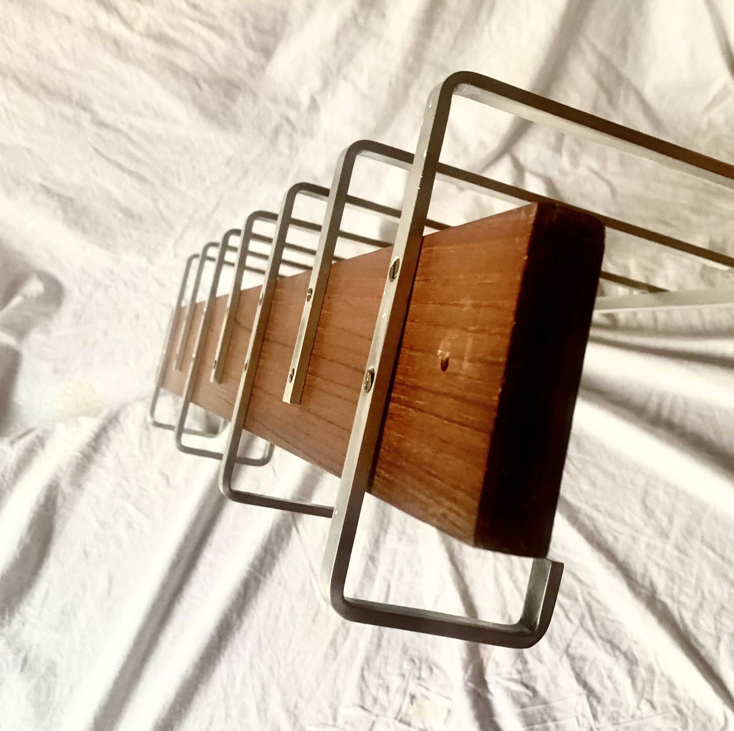 Vintage wall-mounted coat rack made of plywood and aluminum with hat rack
