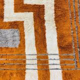 Modern Moroccan rug in rust wool with cream lines 150/250 cm