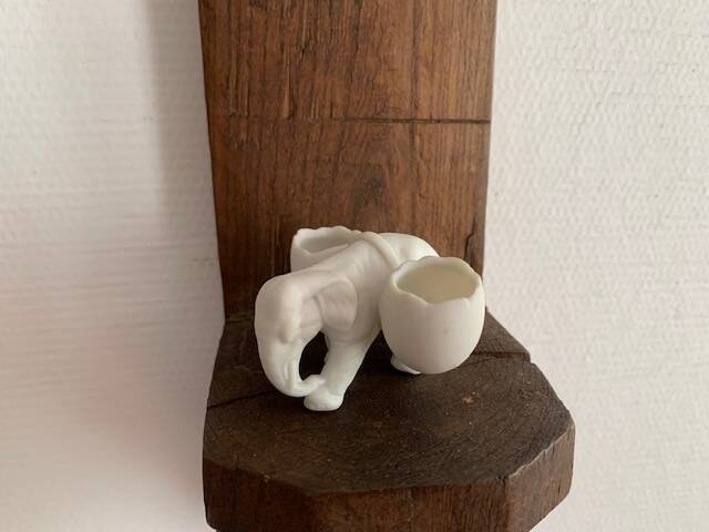 Small elephant in biscuit porcelain, 19th century salt cellars