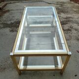 Glass and golden brass coffee table