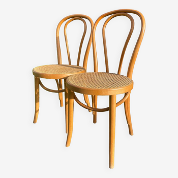 Pair of light wood bistro chairs