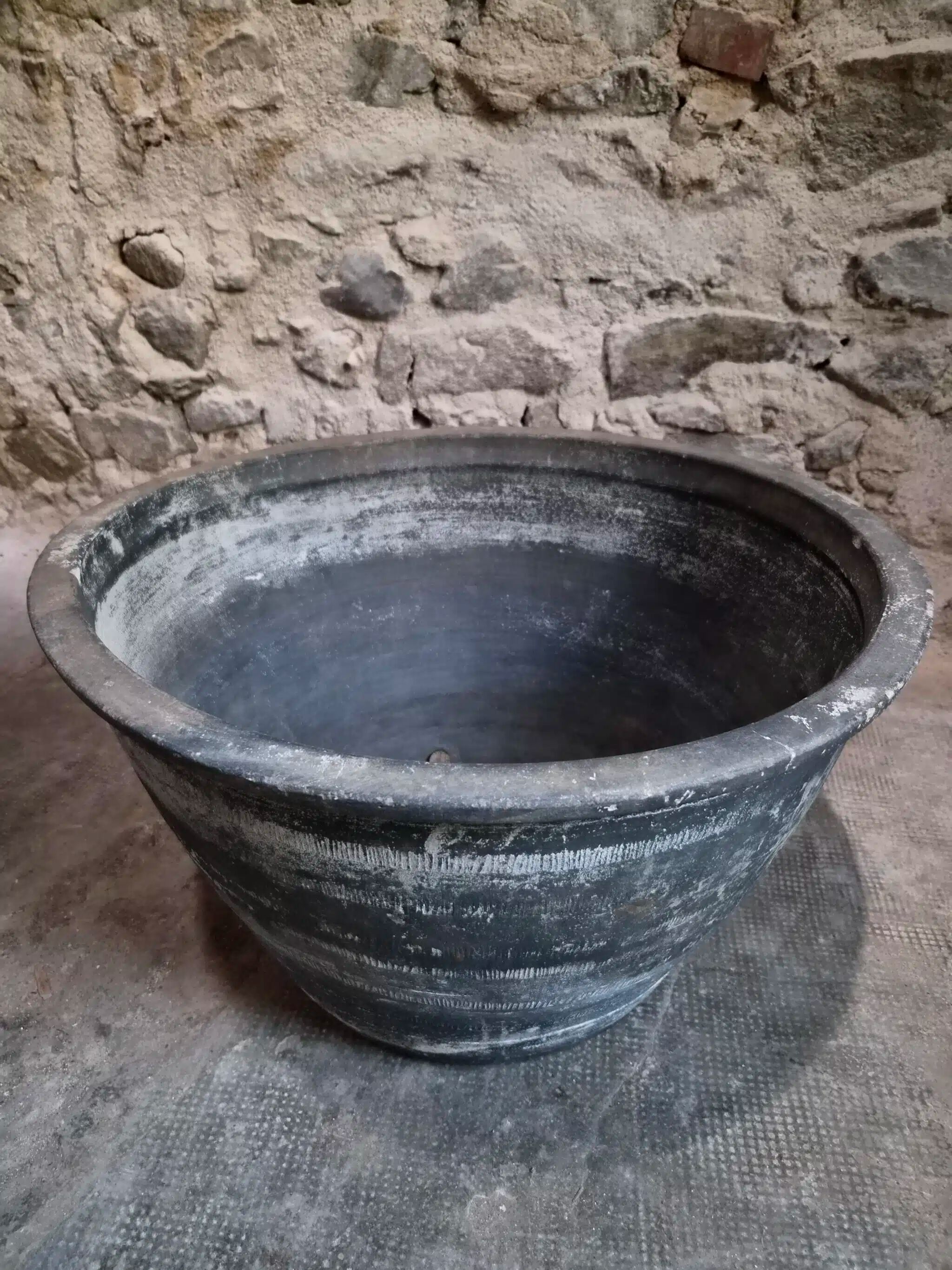 Old rustic washing trough in terracotta, Auvergne, 19th century