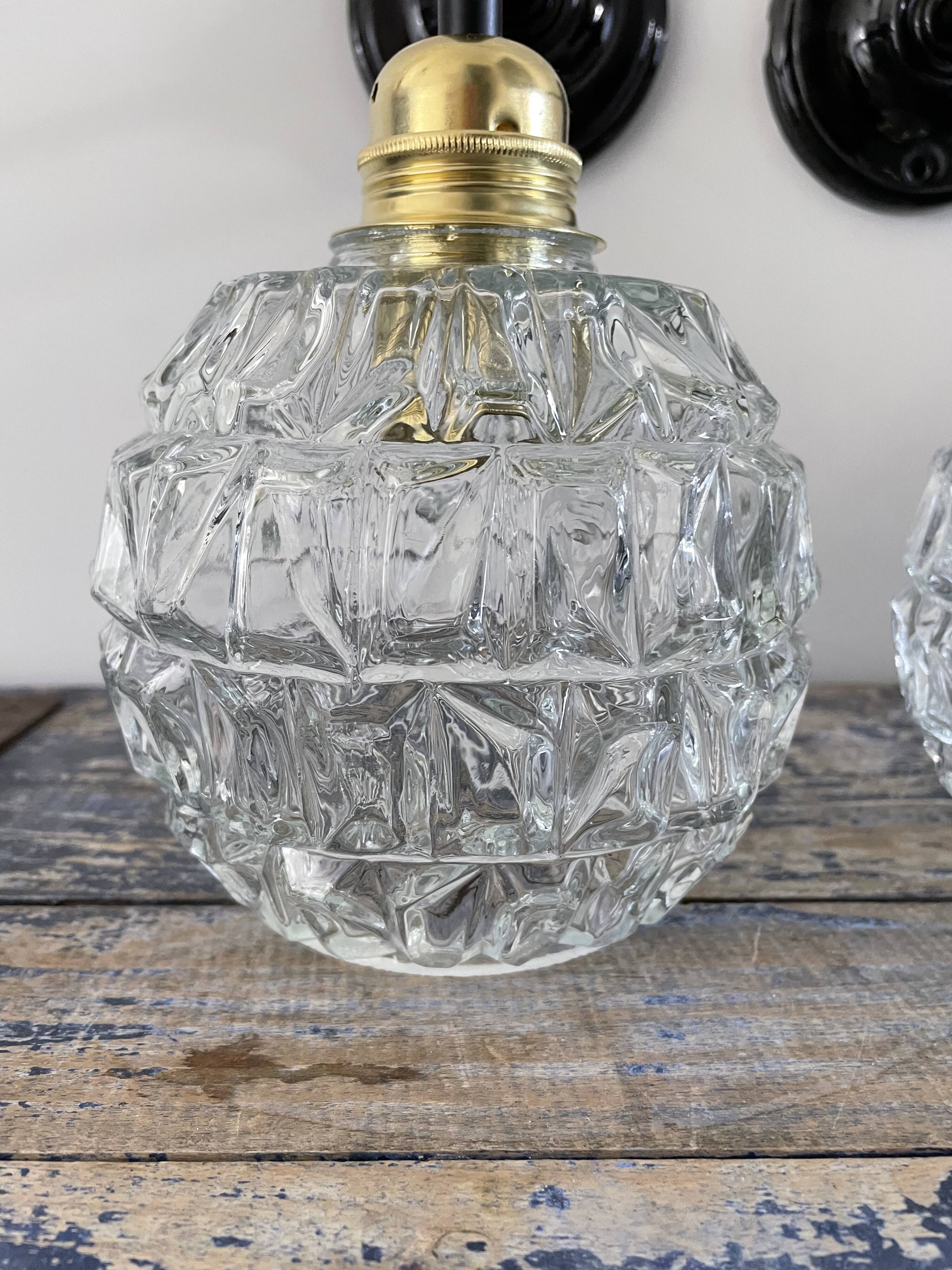 Pair of wall sconces globes in chiseled glass
