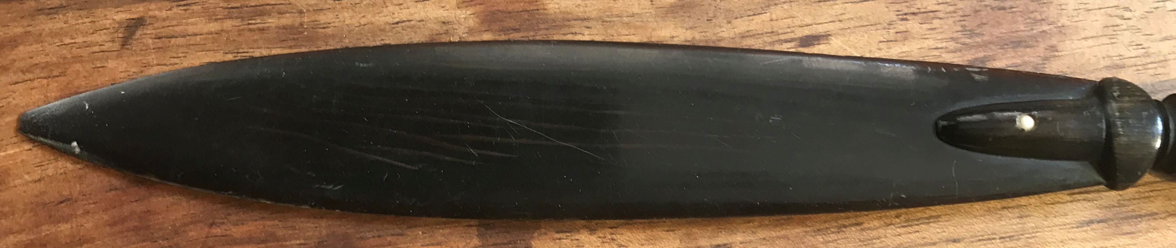 paper cutter in horn and wood. XIX century